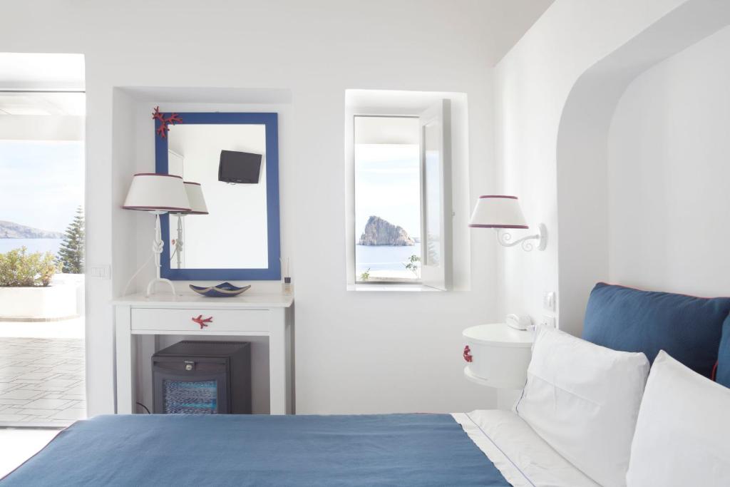 Postel nebo postele na pokoji v ubytování Hotel La Terrazza