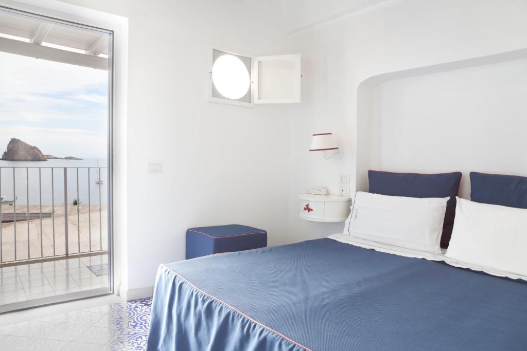 Postel nebo postele na pokoji v ubytování Hotel La Terrazza