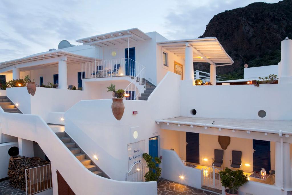 a view of a house with white stairs at Hotel La Terrazza in Panarea