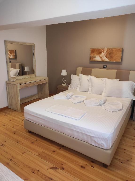 Posteľ alebo postele v izbe v ubytovaní Astradeni luxury apartments Kratir
