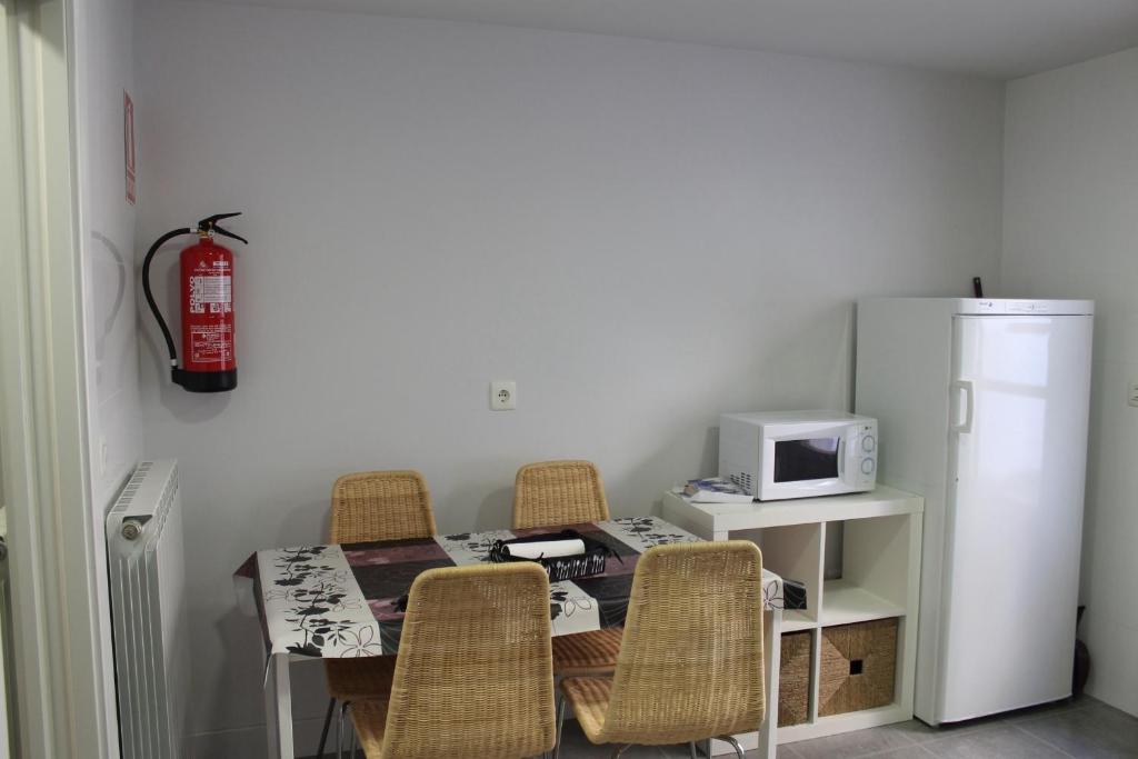 TV a/nebo společenská místnost v ubytování Apartamento Castillo de Arguedas