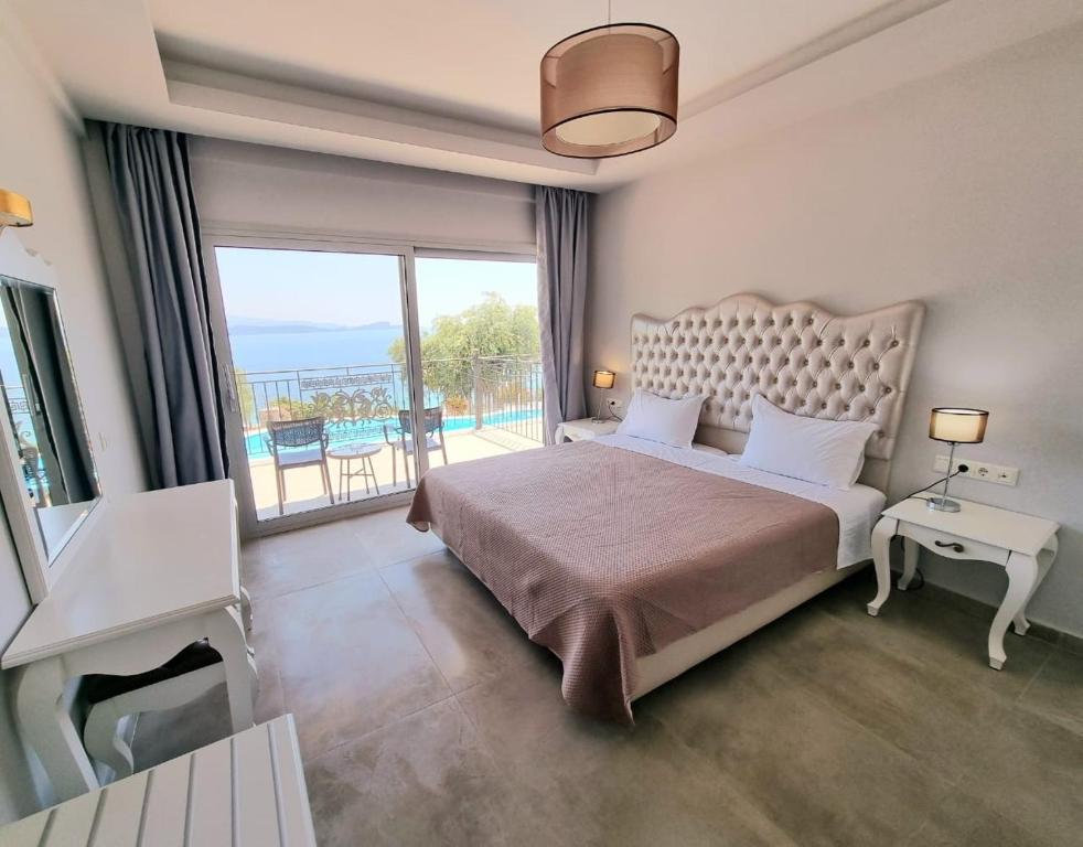 Voodi või voodid majutusasutuse Enjoy Lichnos Bay Village, Camping, Hotel and Apartments toas