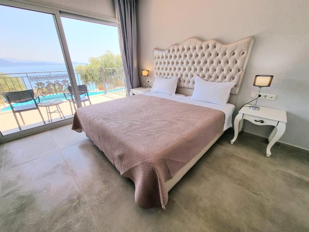 Voodi või voodid majutusasutuse Enjoy Lichnos Bay Village, Camping, Hotel and Apartments toas