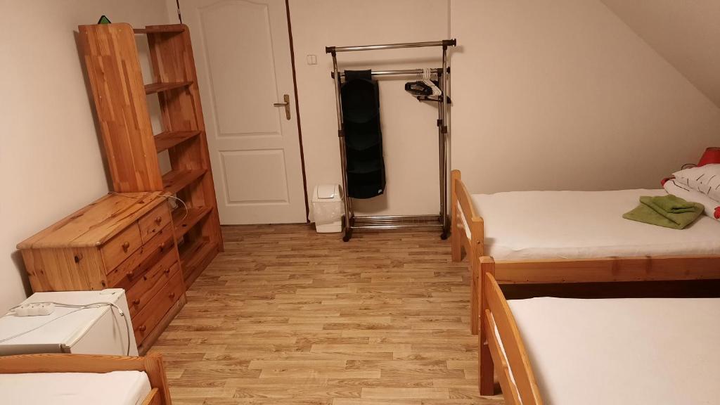 Postel nebo postele na pokoji v ubytování Podkroví v Jihočeském Statku