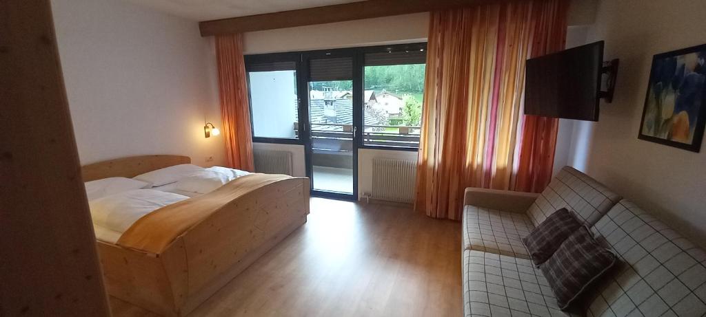 Łóżko lub łóżka w pokoju w obiekcie Residence Tempele