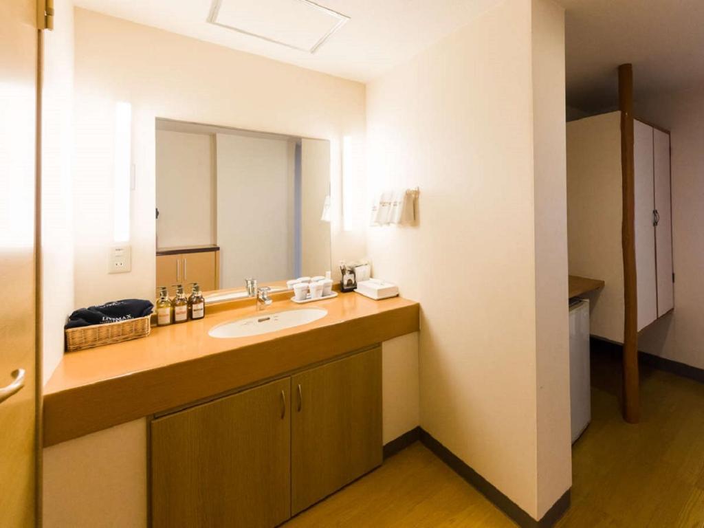 Kuchyň nebo kuchyňský kout v ubytování LiVEMAX RESORT Kawaji
