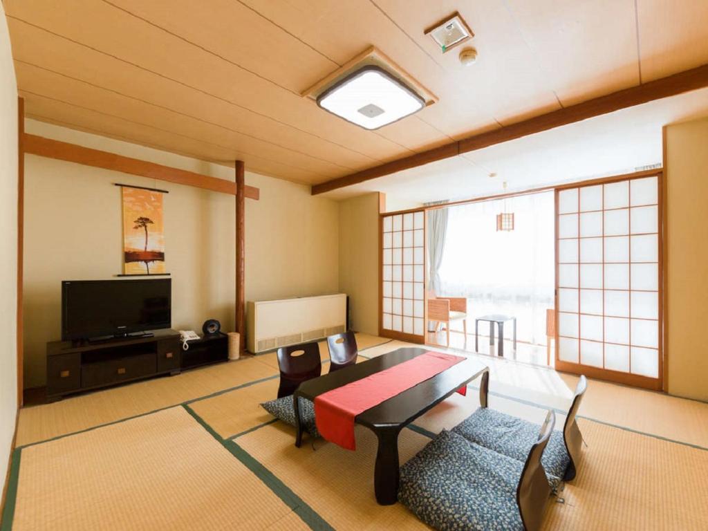 TV a/nebo společenská místnost v ubytování LiVEMAX RESORT Kawaji