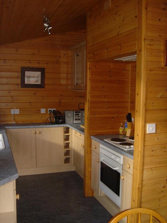 Kuchyň nebo kuchyňský kout v ubytování Loch Lomond Lodge