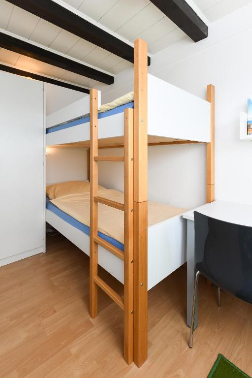 Postel nebo postele na pokoji v ubytování Haus Nordseepferdchen