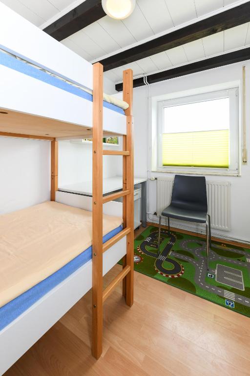 Postel nebo postele na pokoji v ubytování Haus Nordseepferdchen