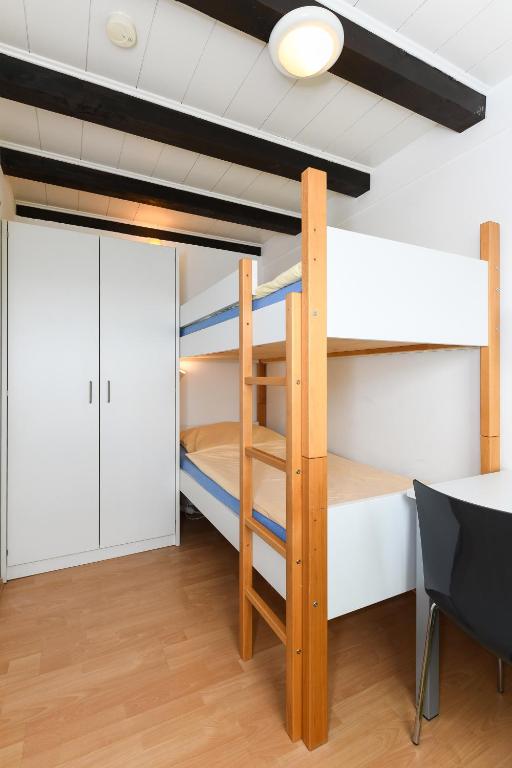 Postel nebo postele na pokoji v ubytování Haus Nordseepferdchen