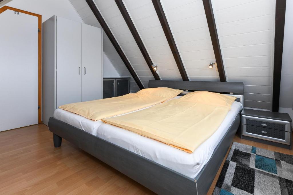 Postel nebo postele na pokoji v ubytování Haus Nordseepferdchen