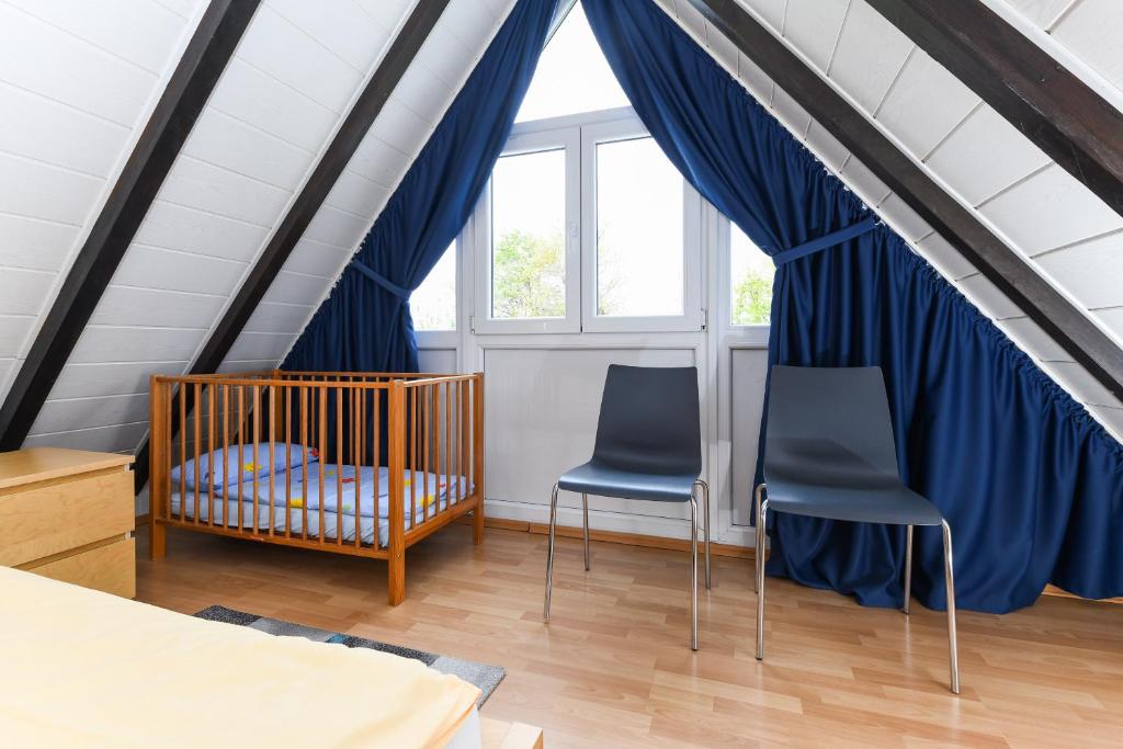Postel nebo postele na pokoji v ubytování Haus Nordseepferdchen