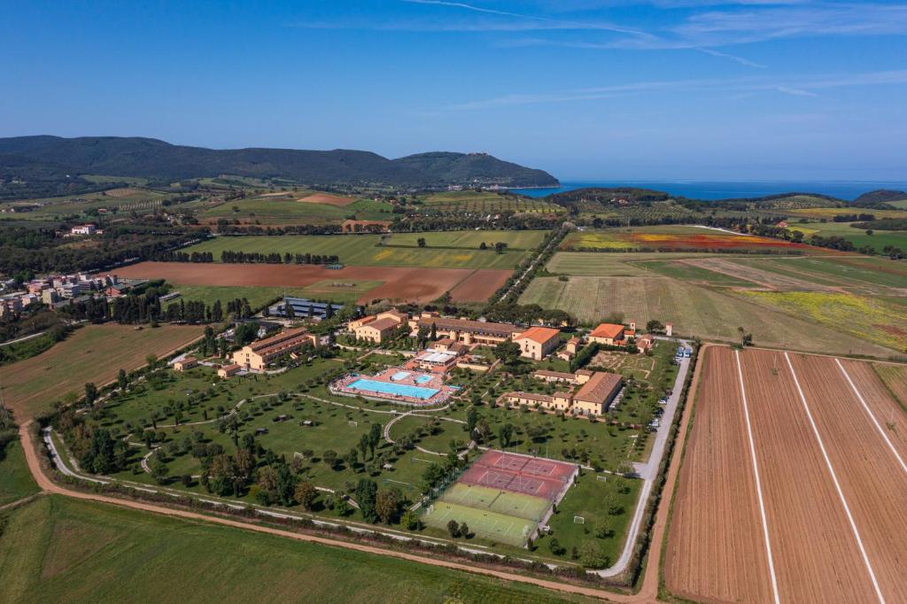 an aerial view of a house and a field at Poggio all'Agnello Sport & Family Holidays in Populonia