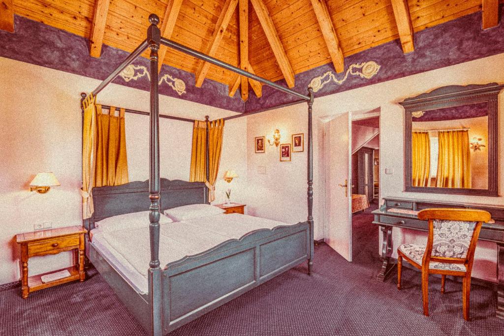 Ένα ή περισσότερα κρεβάτια σε δωμάτιο στο Amadeus Ora & Amore