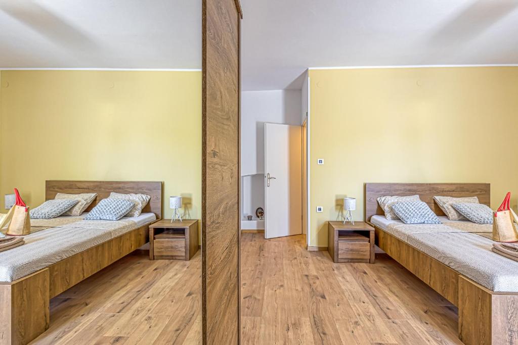 Łóżko lub łóżka w pokoju w obiekcie Eden house
