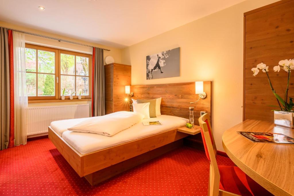 Postel nebo postele na pokoji v ubytování Aparthotel Weinklause Superior