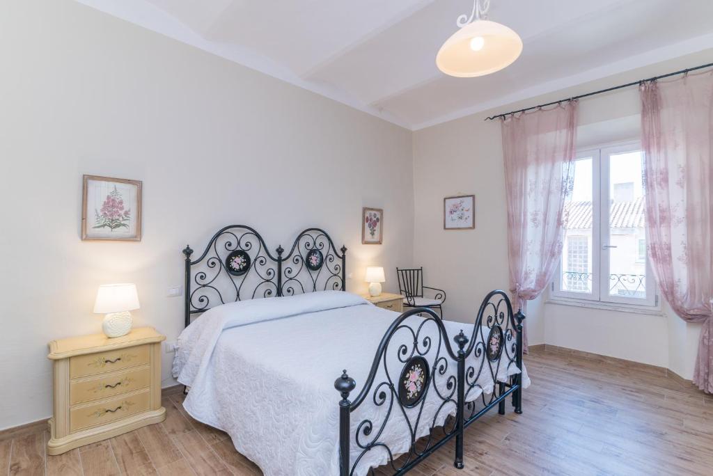 Postel nebo postele na pokoji v ubytování Casa Fiorenza