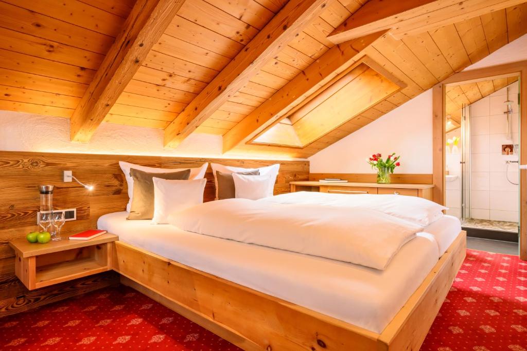 Postel nebo postele na pokoji v ubytování Aparthotel Weinklause Superior