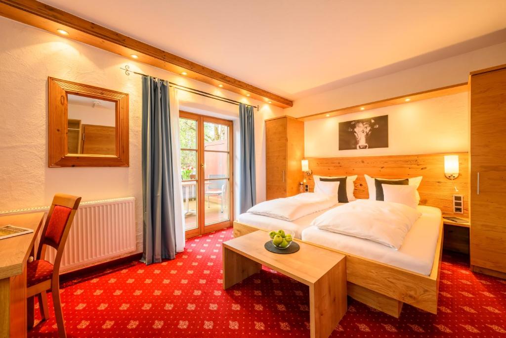 Postel nebo postele na pokoji v ubytování Aparthotel Weinklause Superior