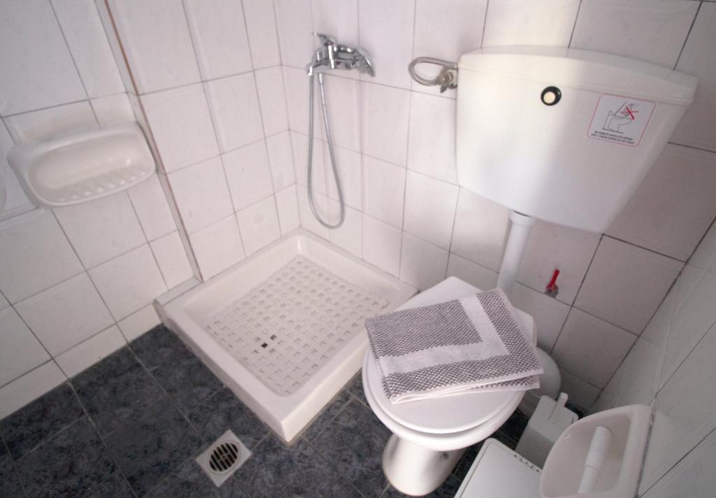 Koupelna v ubytování Pomelo Rooms