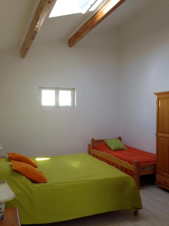 Postel nebo postele na pokoji v ubytování Monténégro, villa dans la baie de Kotor, avec plusieurs appartements tout confort en front de mer!