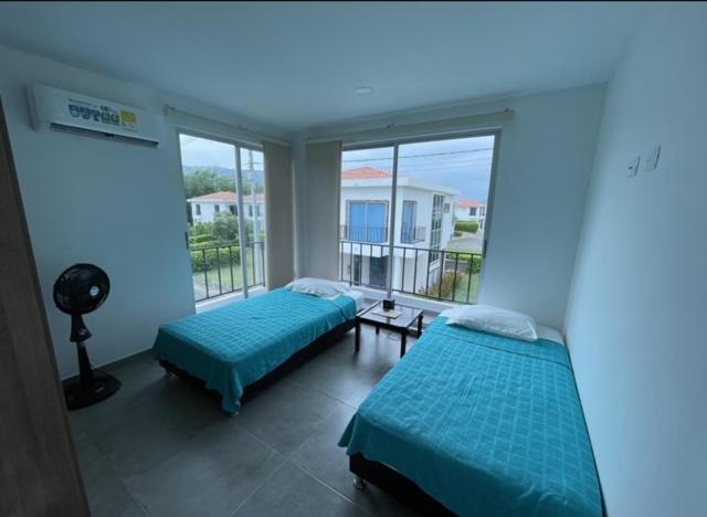 Postel nebo postele na pokoji v ubytování Zion House