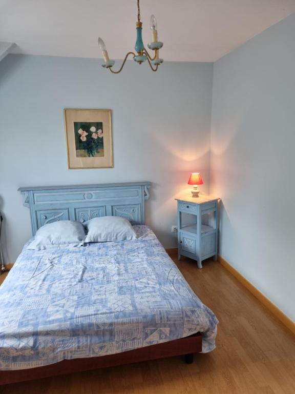 Postel nebo postele na pokoji v ubytování Chambre Miro - Closeries du Golfe