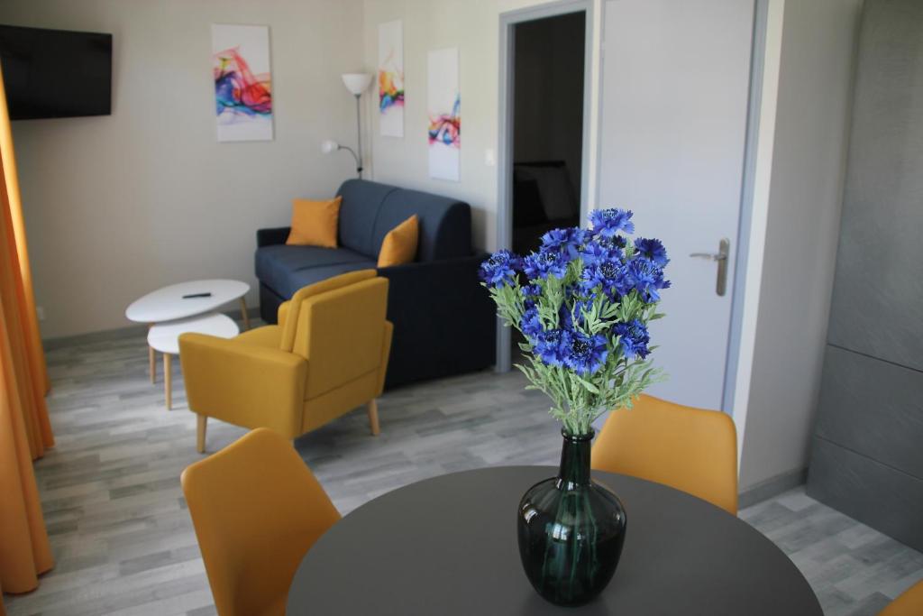 Ruang duduk di Les appartements du Saint Hubert