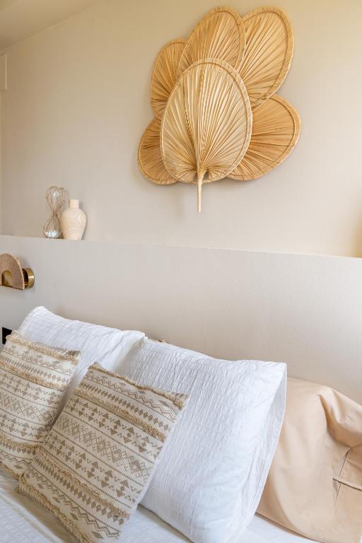 A bed or beds in a room at Jávea Boutique Suites - Holiday Apartments