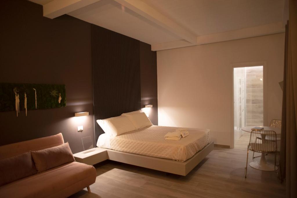 Postel nebo postele na pokoji v ubytování House Room Civico 56