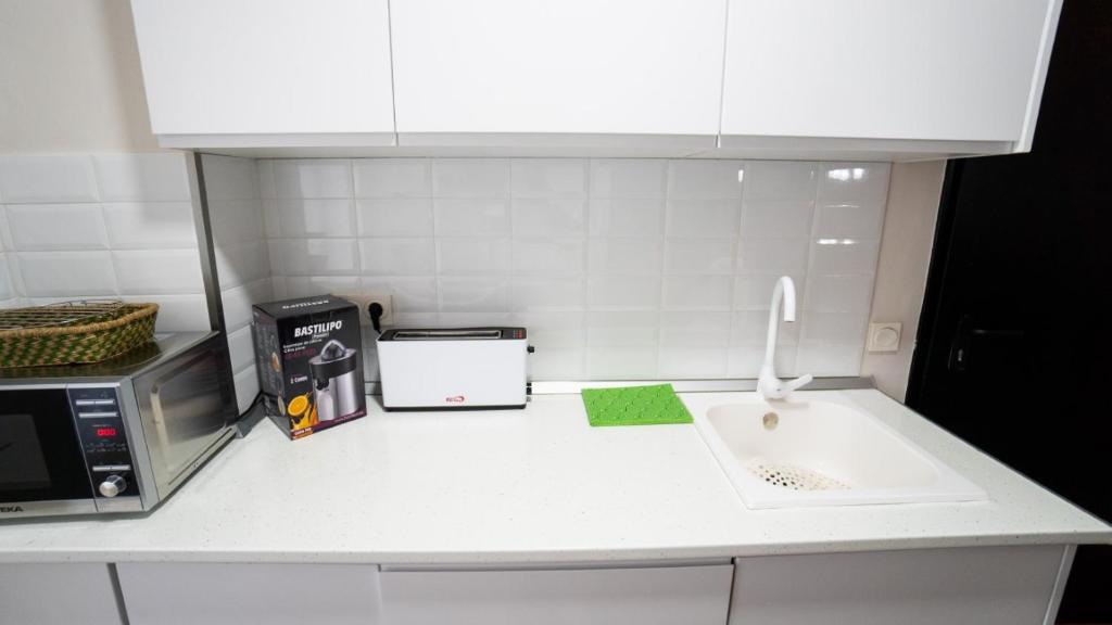 Kuchyň nebo kuchyňský kout v ubytování CASA RURAL TRES VENTAS