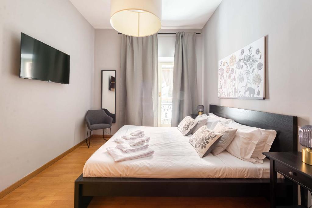 Łóżko lub łóżka w pokoju w obiekcie ELICAL Luxury Apartments