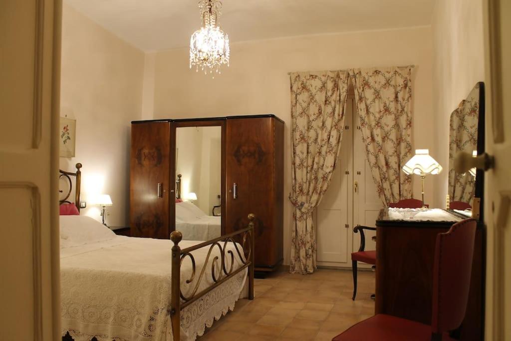 Łóżko lub łóżka w pokoju w obiekcie Case Vacanze Nel Parco Nazionale Del Cilento