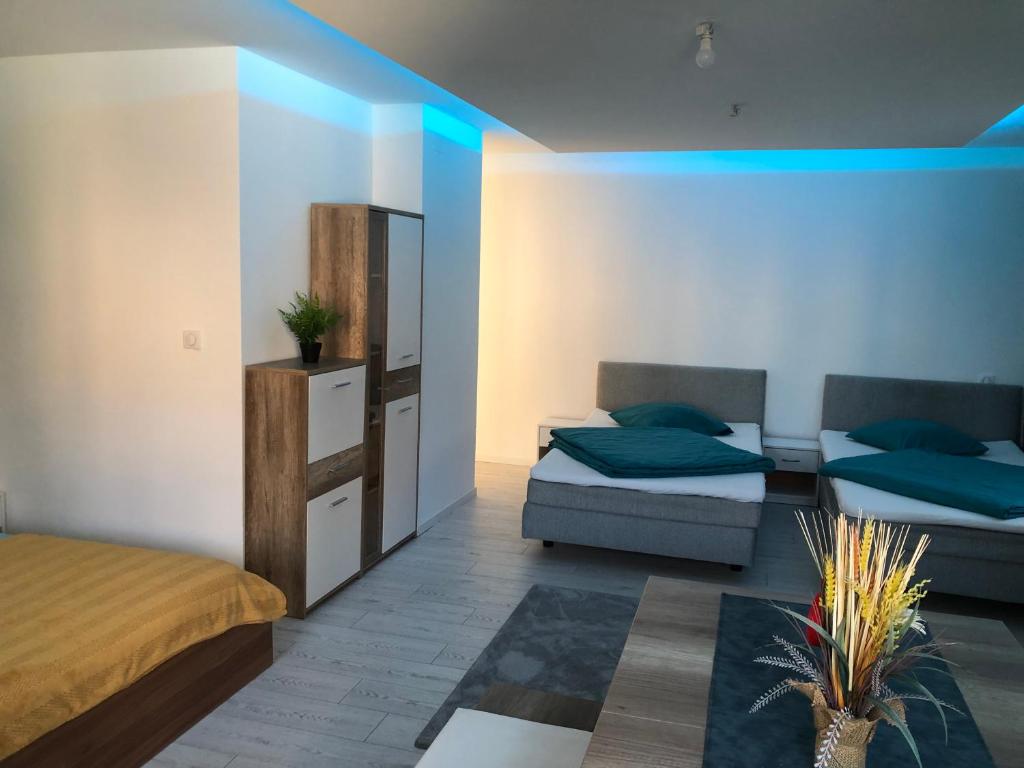 Postel nebo postele na pokoji v ubytování Appartement Willa chez willi