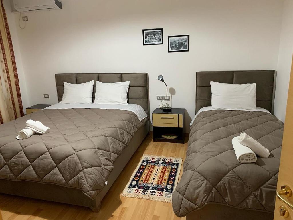Postel nebo postele na pokoji v ubytování Hotel Relax