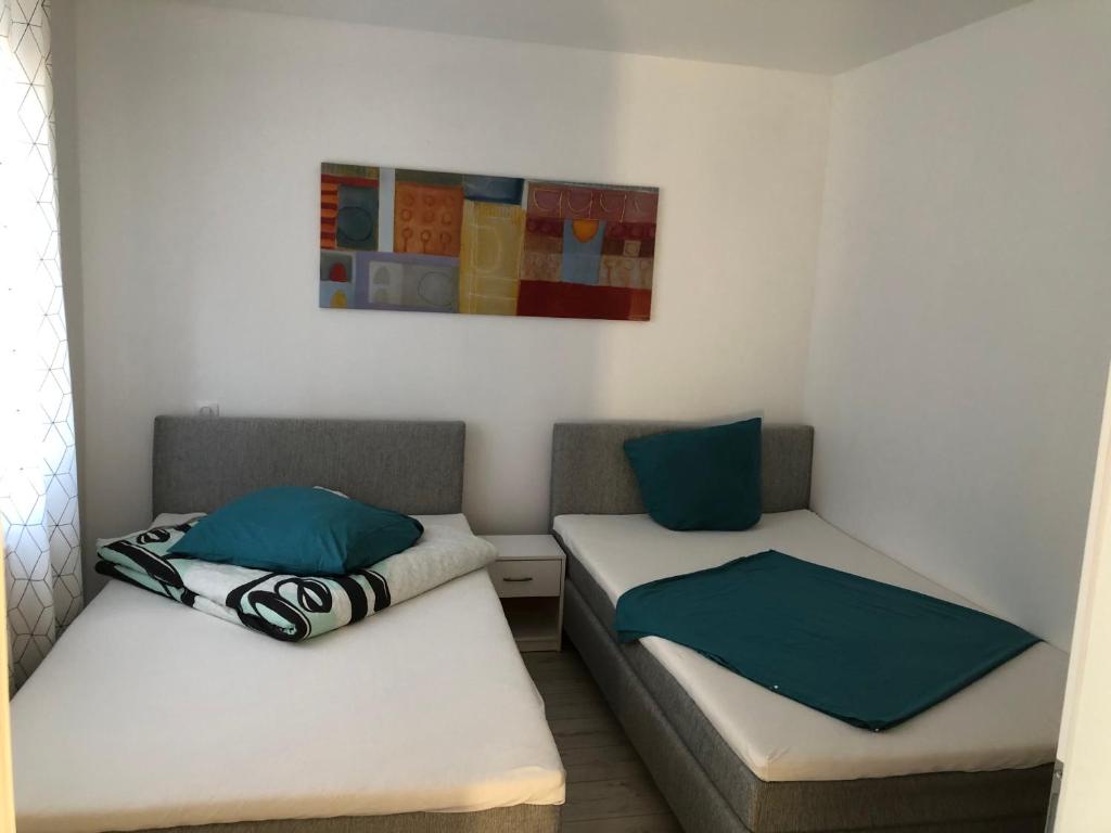 Postel nebo postele na pokoji v ubytování Appartement Willa chez willi