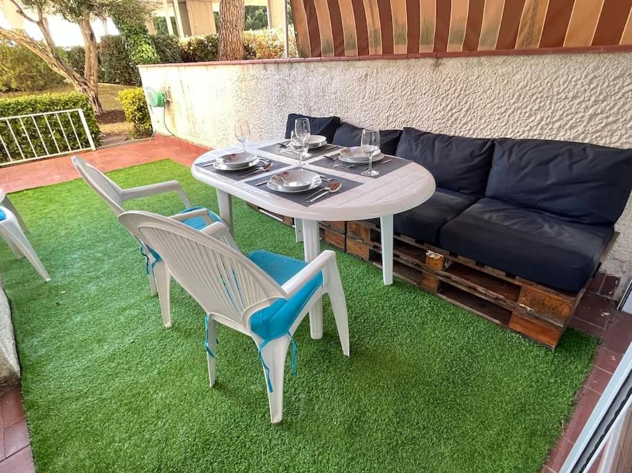 Posedenie v ubytovaní Platja d'Aro - Apartamento en primera línea de mar con parking