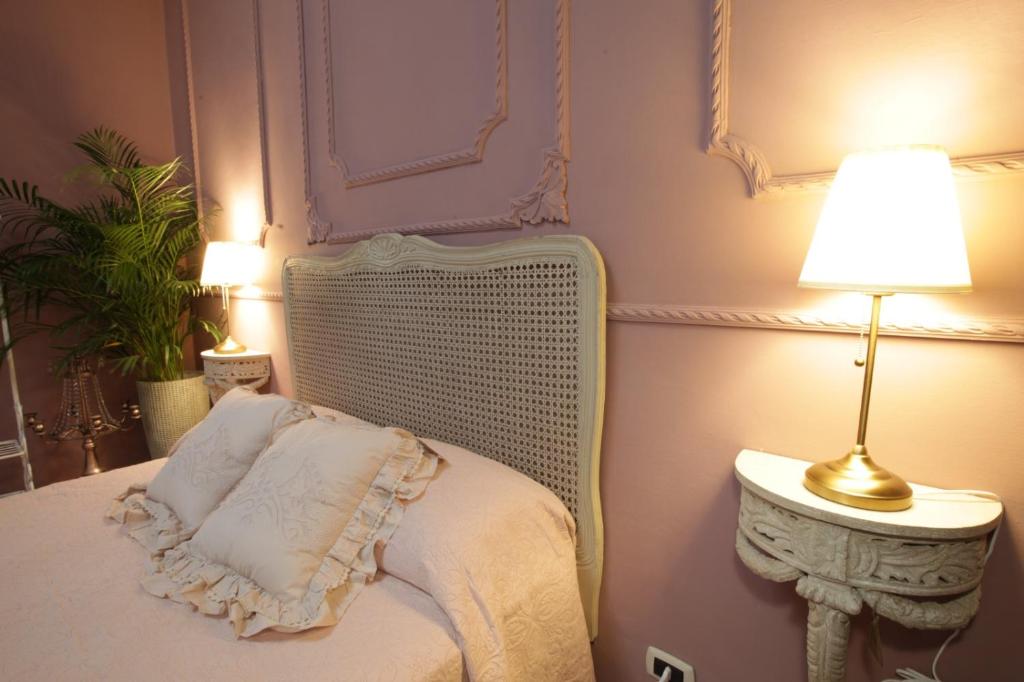 Postel nebo postele na pokoji v ubytování LE ZAGARE B&B - Ares