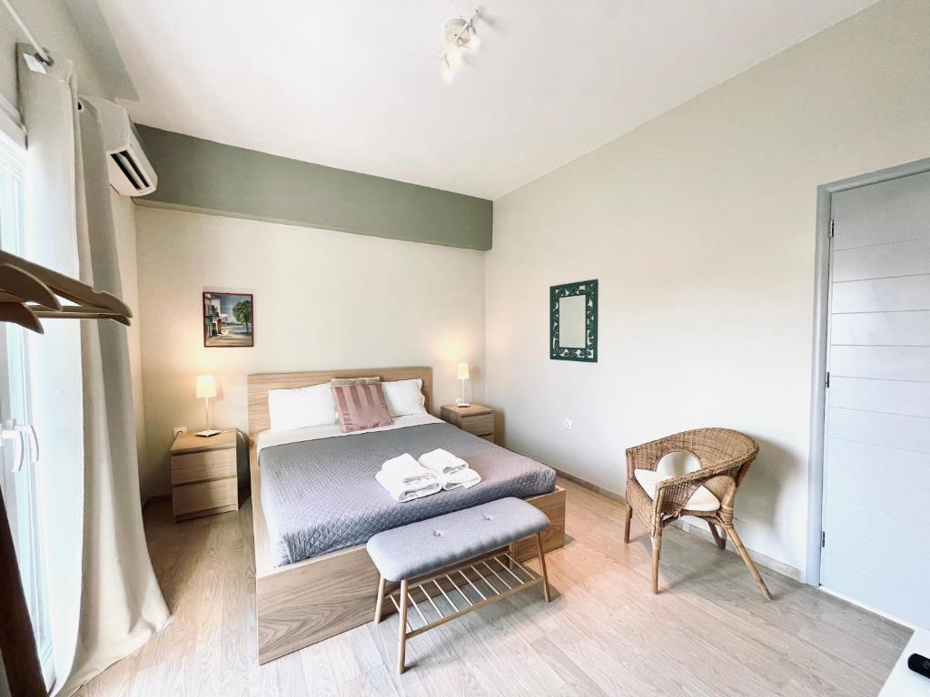 Postel nebo postele na pokoji v ubytování Kappa & Lamda Apartments
