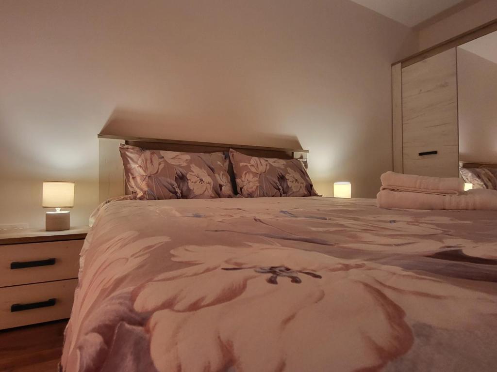 Llit o llits en una habitació de Apartament C&L