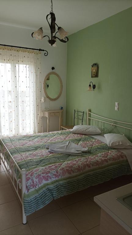 Postel nebo postele na pokoji v ubytování Magic Land