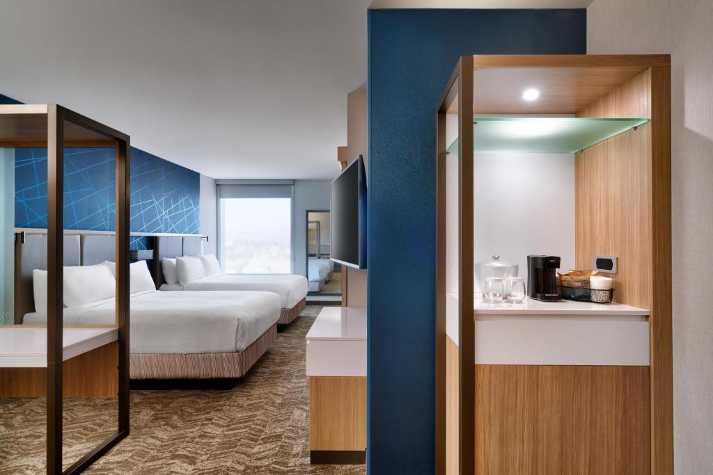 Postel nebo postele na pokoji v ubytování SpringHill Suites by Marriott Cottonwood