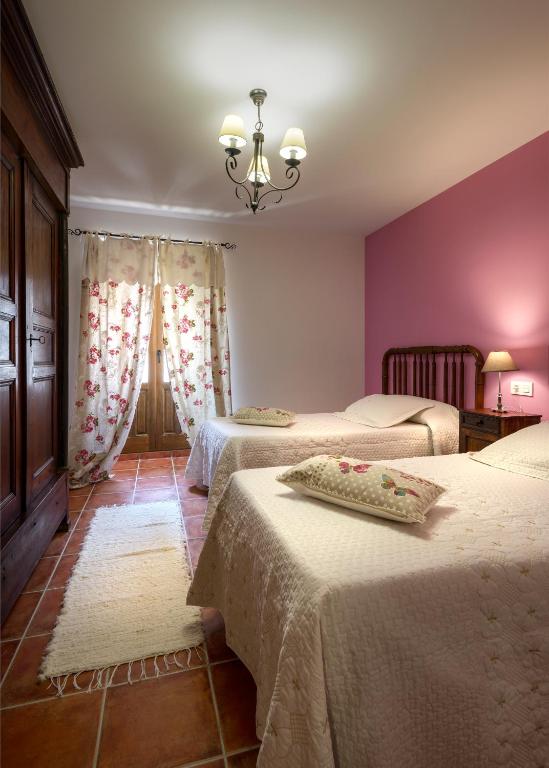 A bed or beds in a room at Paloma