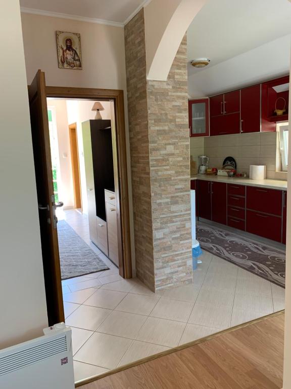 Kuchyň nebo kuchyňský kout v ubytování Apartment Osmajic