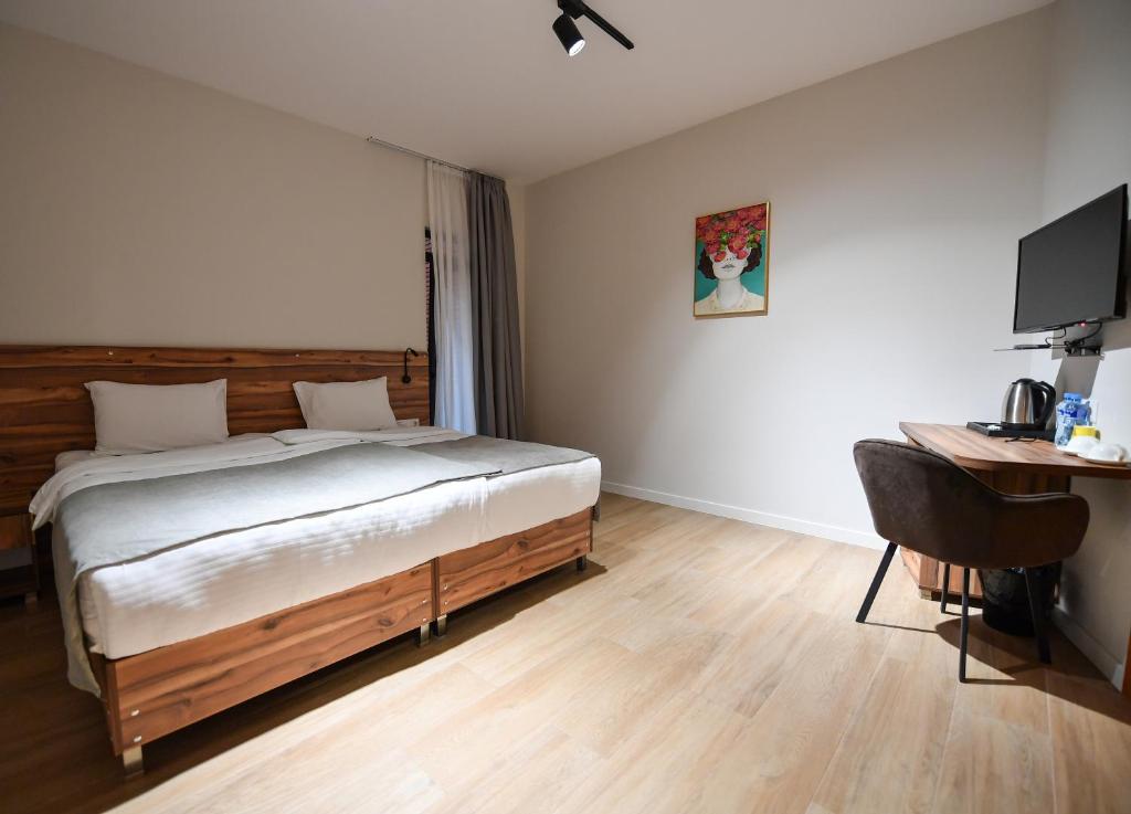 Postel nebo postele na pokoji v ubytování Address Boutique Hotel