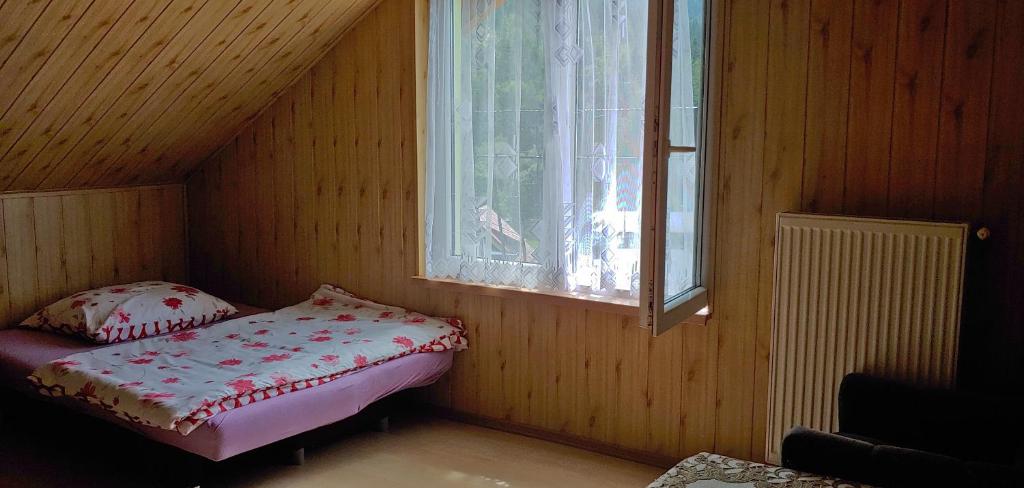 Posteľ alebo postele v izbe v ubytovaní Pati Apartament Słonko