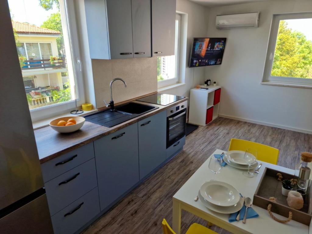 Kuchyň nebo kuchyňský kout v ubytování Anna24 Holidays
