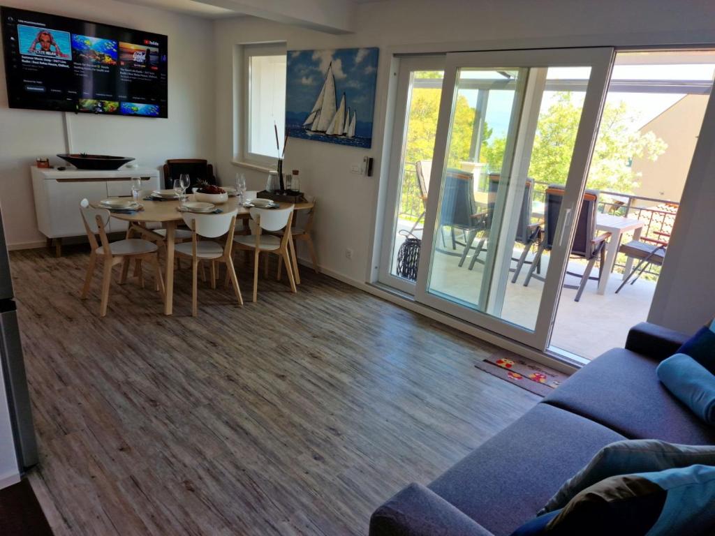TV a/nebo společenská místnost v ubytování Anna24 Holidays