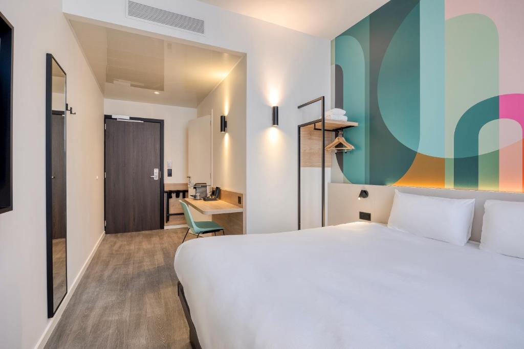 Postel nebo postele na pokoji v ubytování B&B HOTEL Hasselt